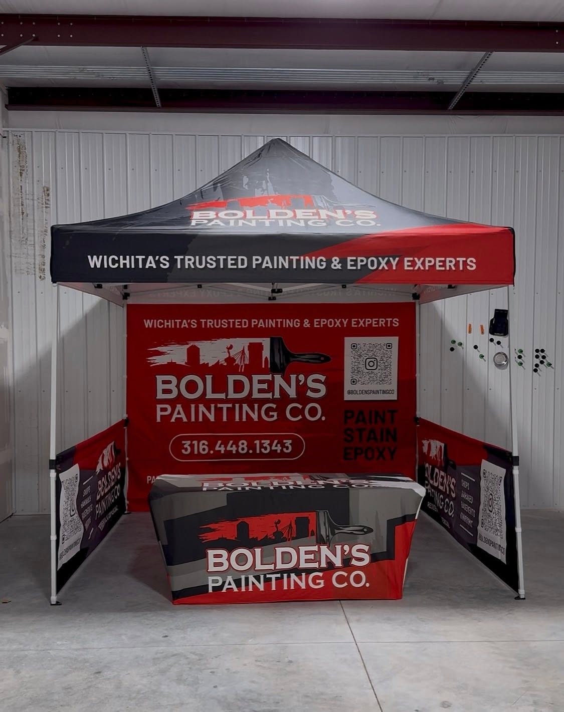 Branded event tent with matching table cover made by Wichita Wrap Co